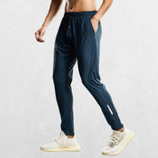 Versatile blue-gray sweatpants for fitness and everyday comfort.