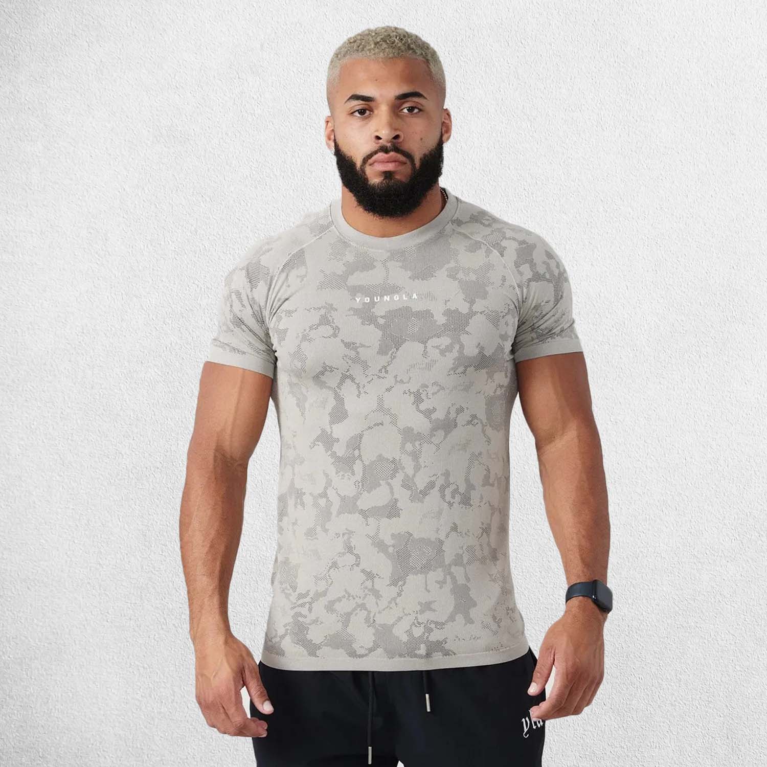 Front view showcasing raglan cut, YoungLA logo, and digital pattern for gym and sports.