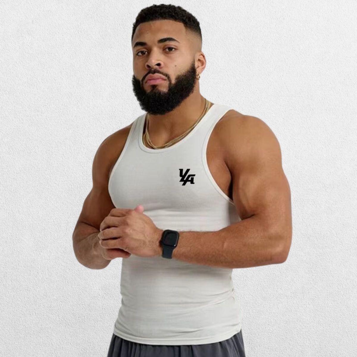 Men’s Slim-Fit Ribbed Muscle Vest in white, highlighting the sleek slim-fit design and breathable ice silk fabric perfect for workouts