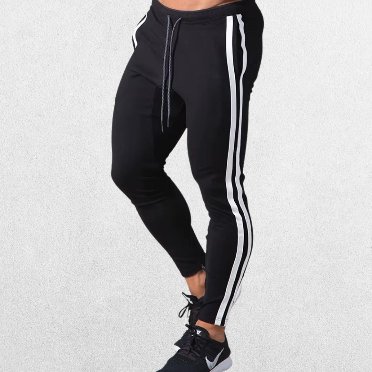 Front view of Men’s Striped Joggers in black, showcasing the adjustable drawstring waist and slim fit.