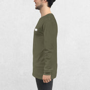 Side View of Model wearing the Military Green GPW Long Sleeve Tee paired with jeans in a Studio Background.