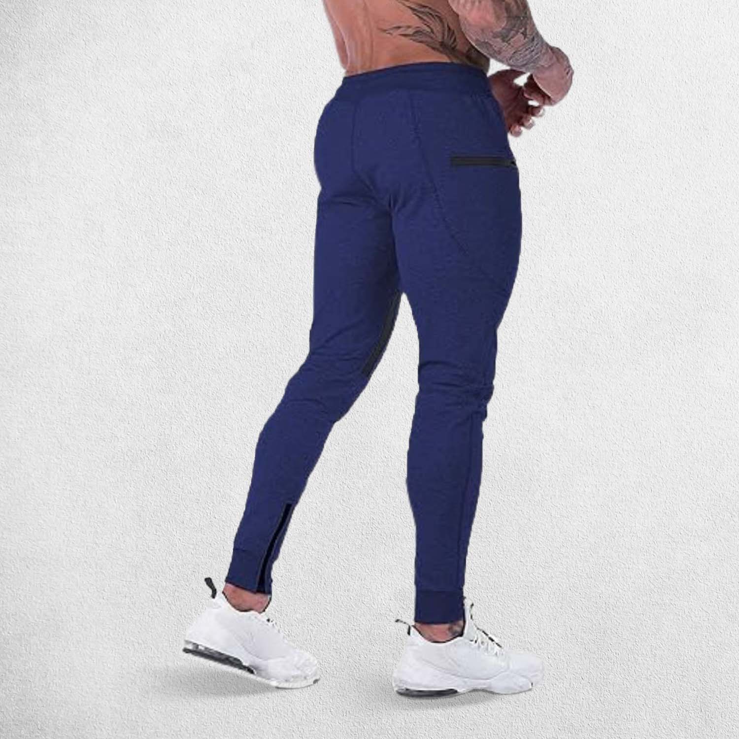 Side pose of model wearing Navy GPW Men's Slim Fit Trousers with Zipper Pockets for Training