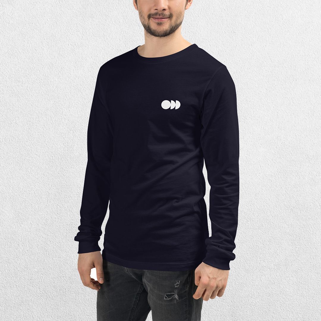Model wearing the Black GPW Long Sleeve Tee paired with jeans in a Studio Background.