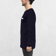 Side View of Model wearing the Navy GPW Long Sleeve Tee paired with jeans in a Studio Background.