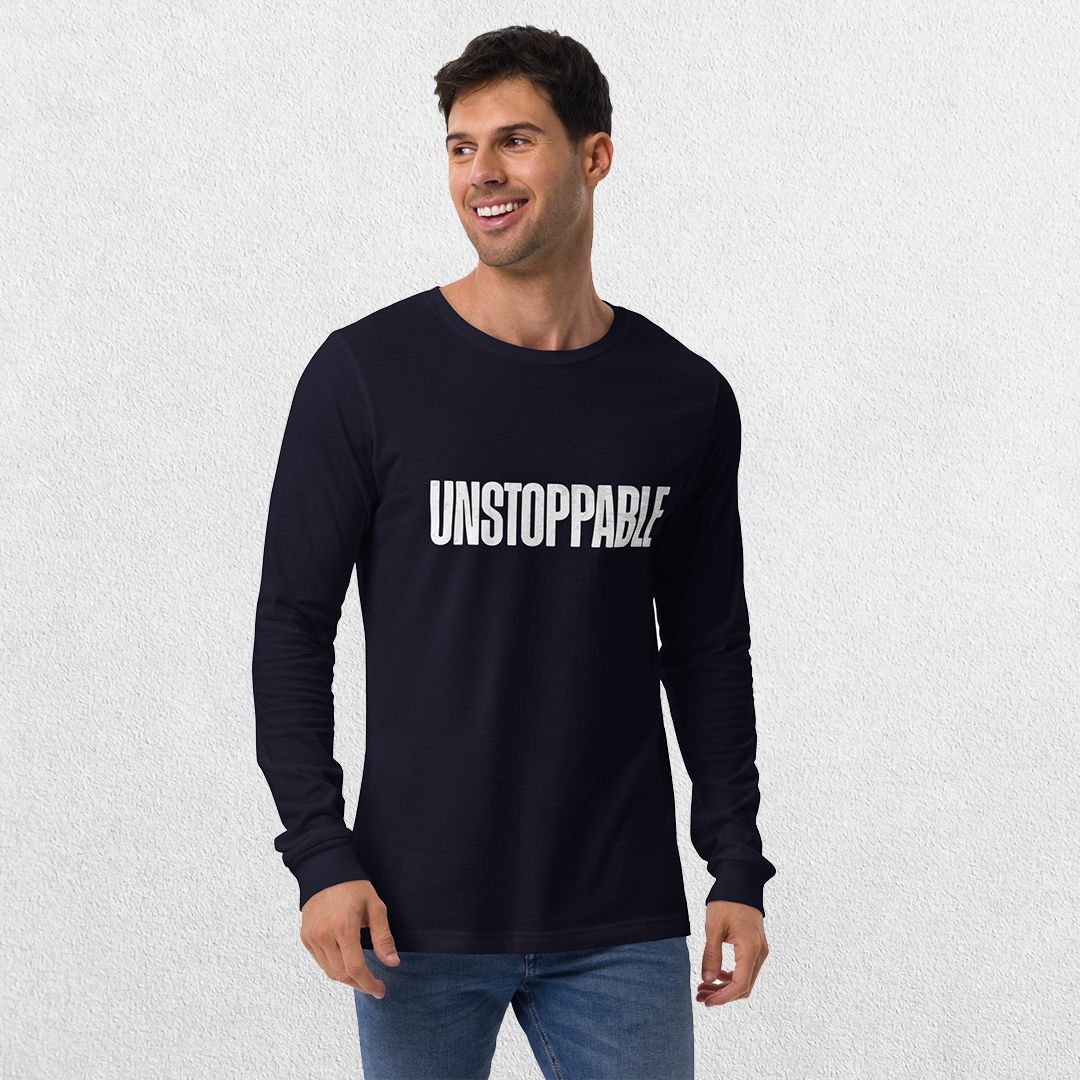 Model wearing the Navy GPW Unisex Long Sleeve Tee with Unstoppable Design with jeans.