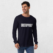 Model wearing the Navy GPW Unisex Long Sleeve Tee with Unstoppable Design with jeans.