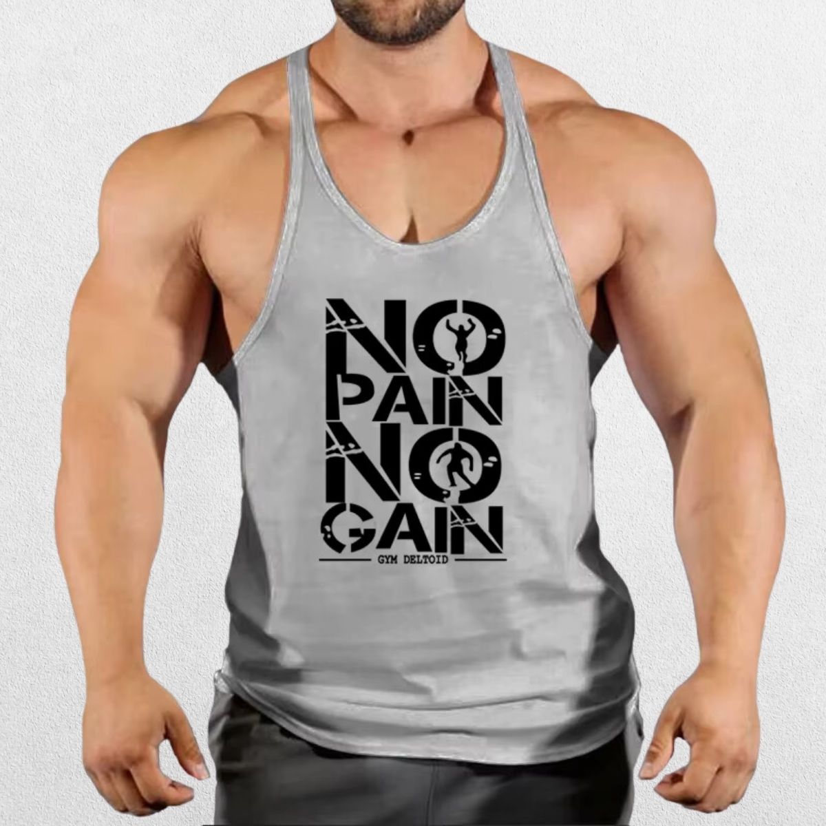 Model posing in No Pain No Gain Men’s Gym Vest in grey, highlighting breathable fabric and sporty look.