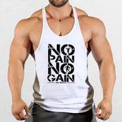 Model wearing No Pain No Gain Men’s Gym Vest in white, showcasing bold graphic design and athletic fit.