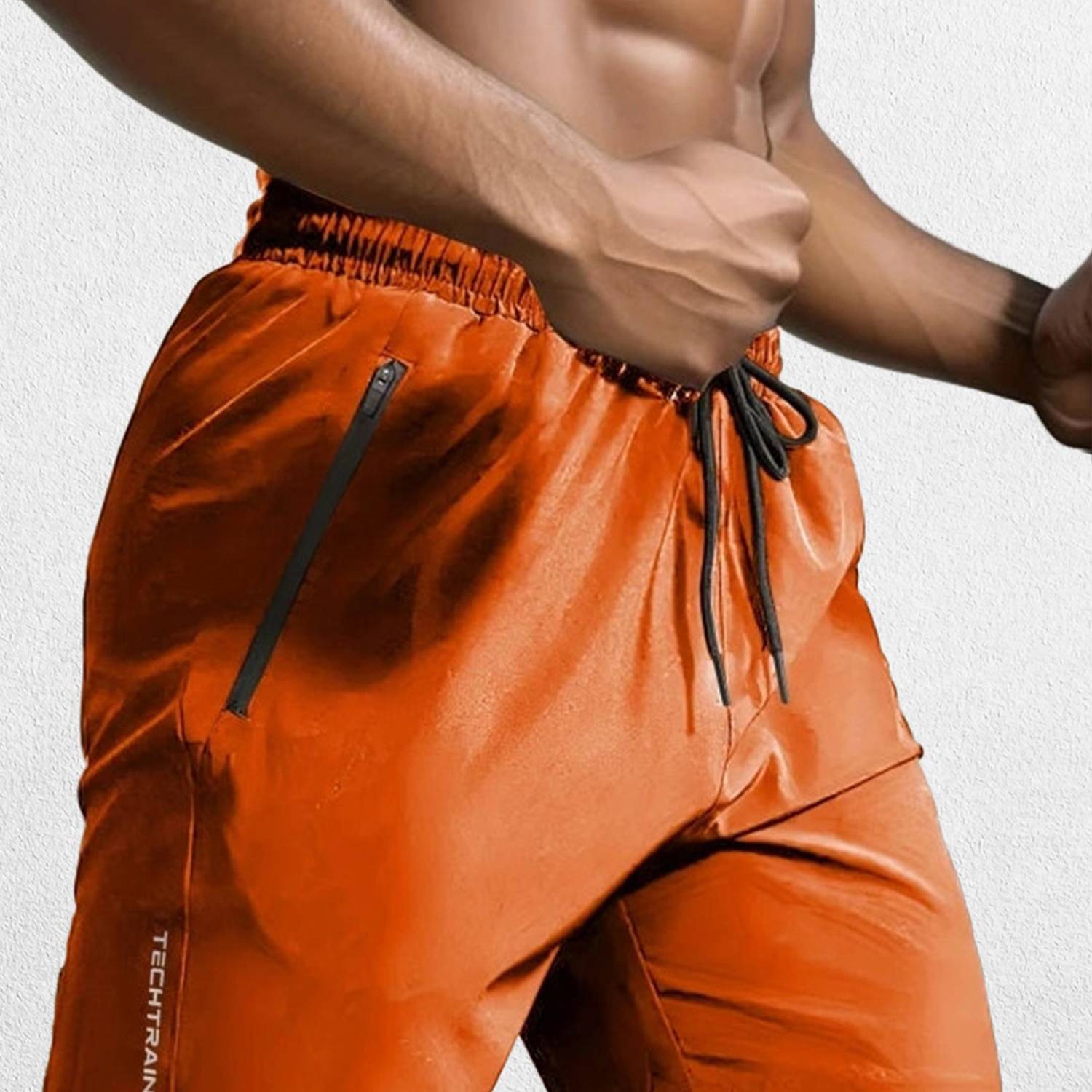Front view of Orange GPW Men’s Lightweight Polyester Athletic Shorts with breathable fabric.