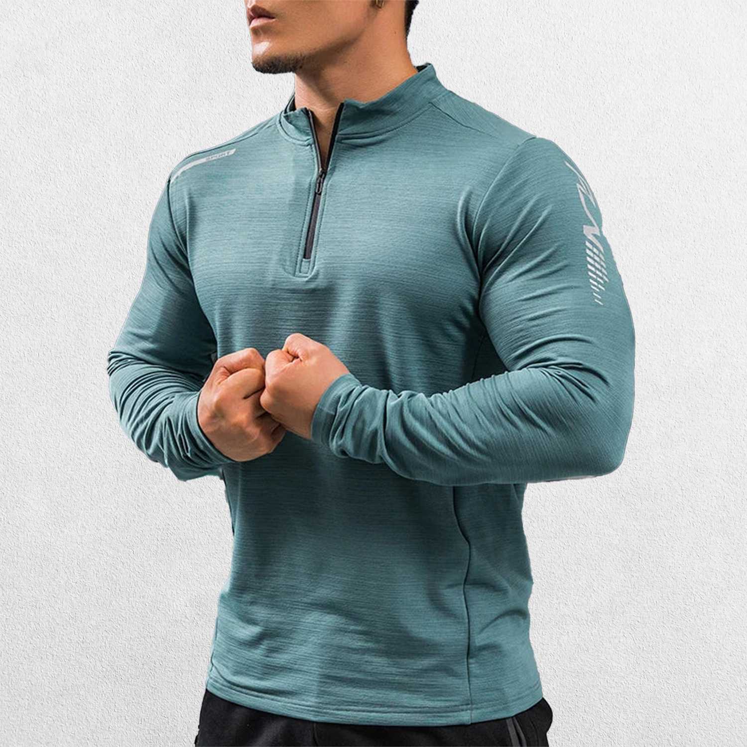 Close-up of Payne Gray Green GPW Men's Compression Shirt - Long Sleeve Rashguard for Fitness in a studio background
