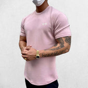 Model wearing Pink GPW Men's Fit Summer Gym T-Shirt - Bodybuilding Streetwear Tee