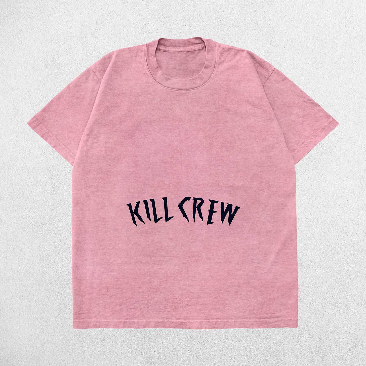 Close-up of Pink acid-wash fabric texture on Kill Crew Summer Tee.