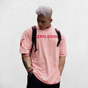 Close-up of Pink breathable cotton fabric texture for the King Kong Print T-Shirt.