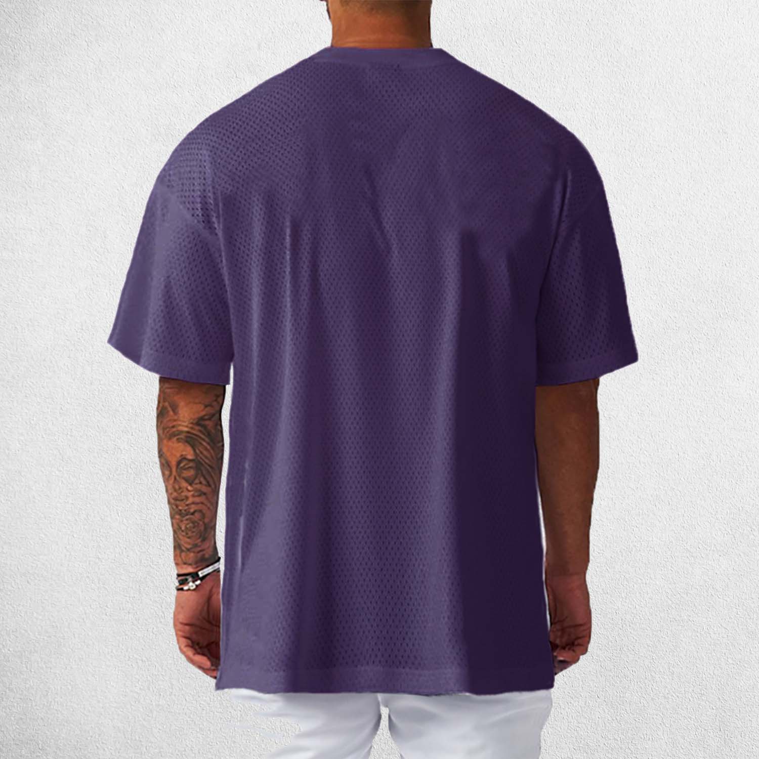 Back View of Model Wearing Purple Men's Oversized Gym T-Shirt – Breathable, Quick-Drying & Lightweight Training Tee