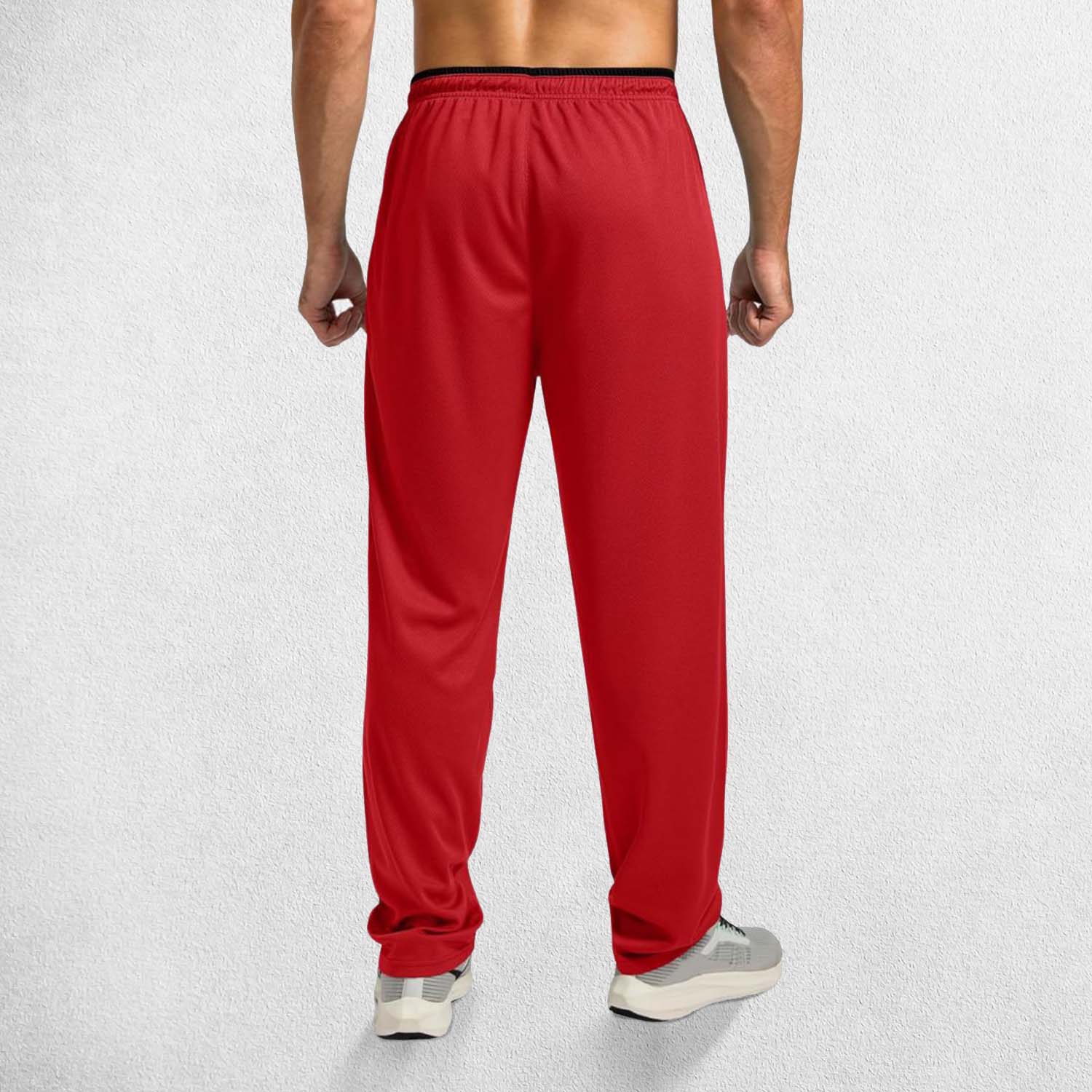 Rear View of Model Wearing Red GPW Men’s Open-Bottom Workout Trousers with Zip Pockets and Lightweight Mesh