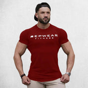 Front Pose of Model wearing Red Men’s Athletic Fit Gym T-Shirt – Breathable Cotton Workout Shirt for Training & Casual Wear