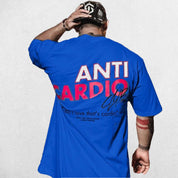Model wearing Royal Blue Anti Cardio Oversized T-Shirt paired for casual athleisure look.