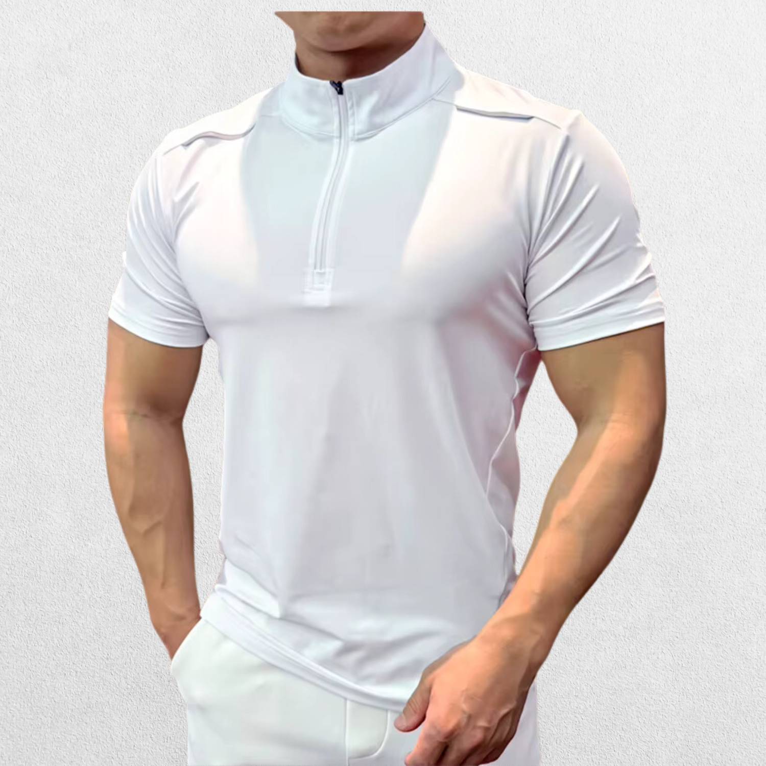 Side profile of the GPW Men's High-Performance Short Sleeve Training Shirt in white, emphasizing the smooth fit and sweat-wicking fabric with a neutral studio backdrop.