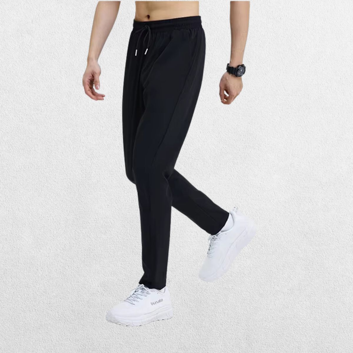 Side profile of the GPW Men's Slim Fit Pencil Pants in black, emphasizing the slim leg design and stretch fabric with a neutral studio background.