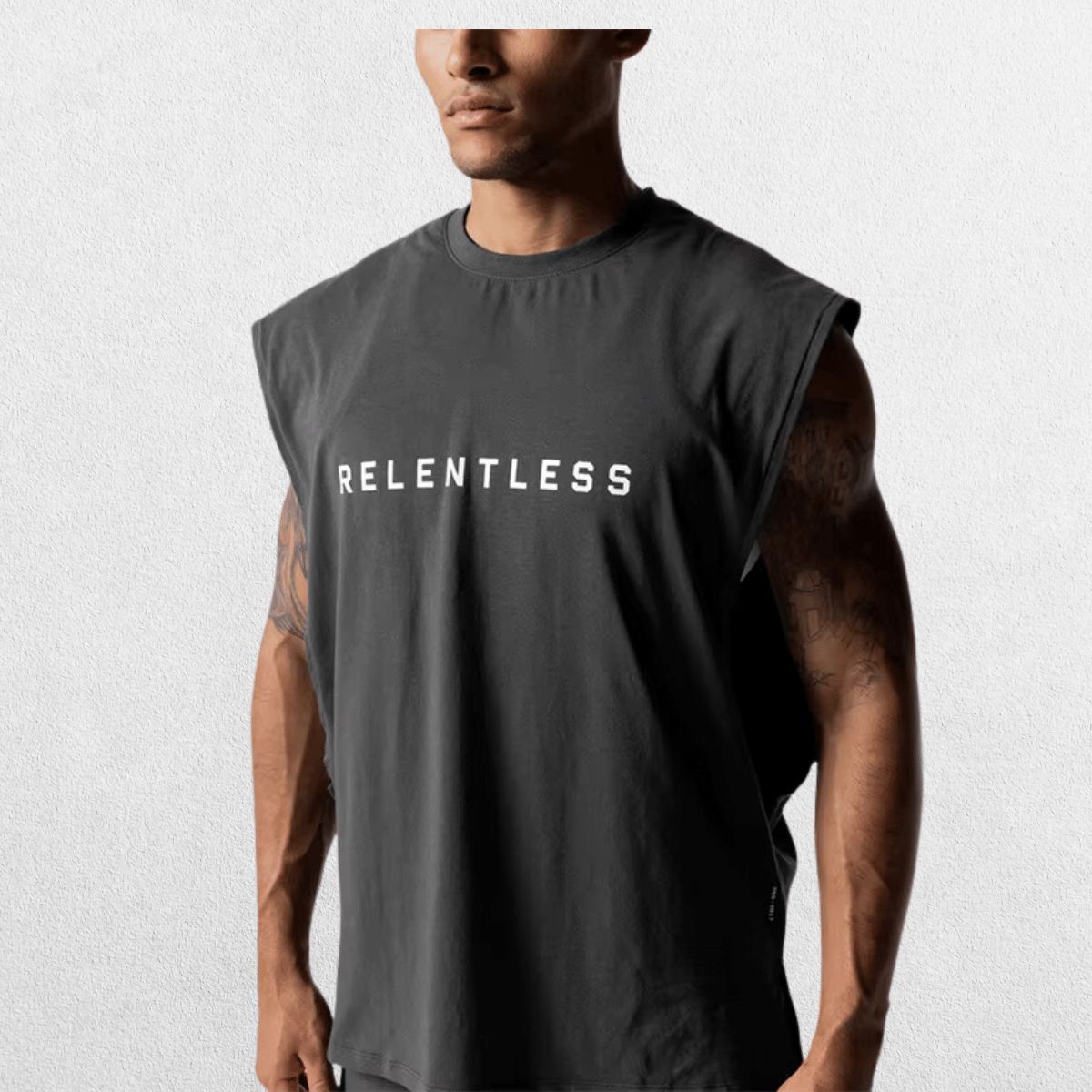 Side view of GPW Men's Performance Round Neck Sleeveless Shirt in grey, featuring clean lines and comfortable fit with a subtle studio background.