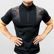 Side view of the GPW Men's High-Performance Short Sleeve Training Shirt in black, showcasing the ergonomic cut and breathable material with a neutral studio backdrop.
