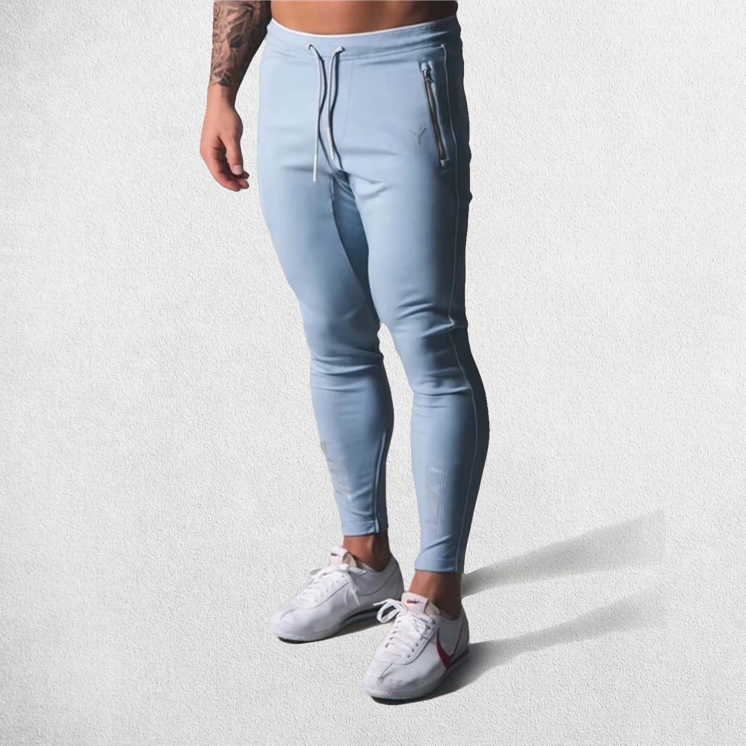 Front View of Model Wearing Sky Blue Men’s gym joggers with breathable quick-dry fabric for fitness and running