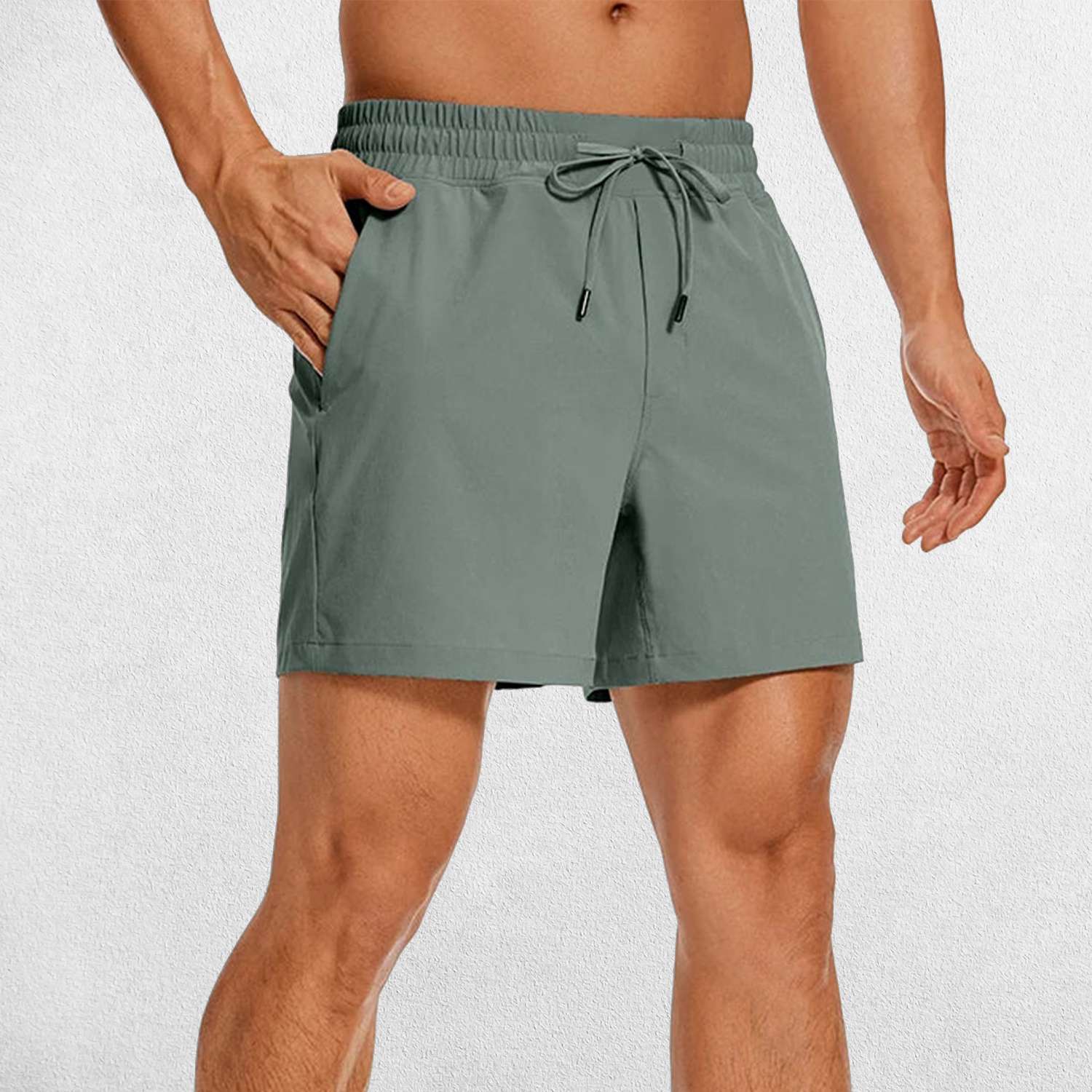 Front Close-up of Slate Gray GPW Men's Lightweight Quick-Dry Workout Shorts with Pockets in a studio background