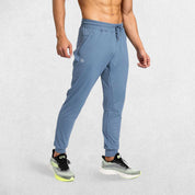 State Blue GPW Men's Athletic Sweatpants featuring zipper pockets, athletic fit, and sleek design.