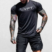 Model wearing Summer T-shirt Jogger Quick Dry Sports Shirt in black color