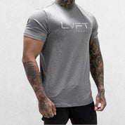 Model wearing Summer T-shirt Jogger Quick Dry Sports Shirt in grey
