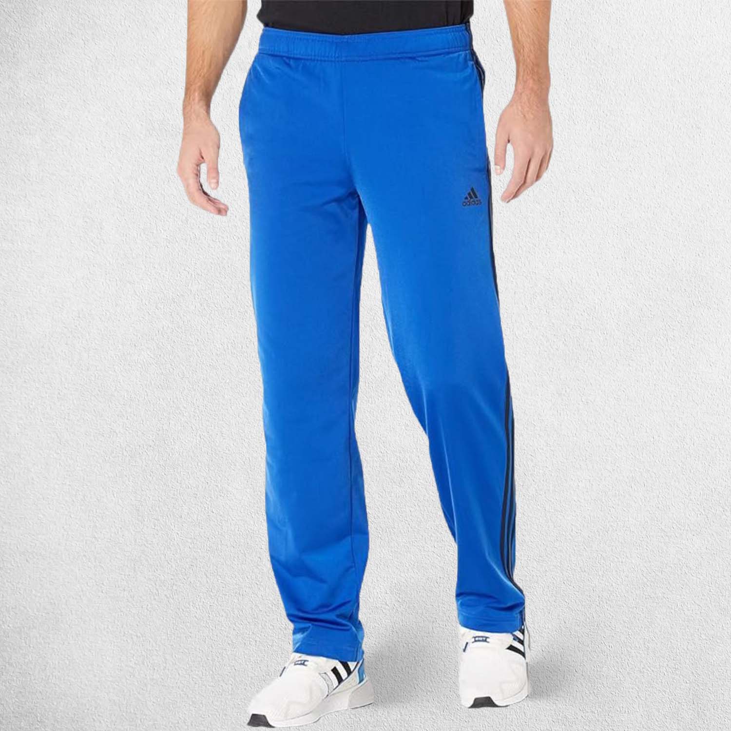 Model Wearing Team Royal Blue 3-Stripes Tracksuit Pants made with Primegreen fabric