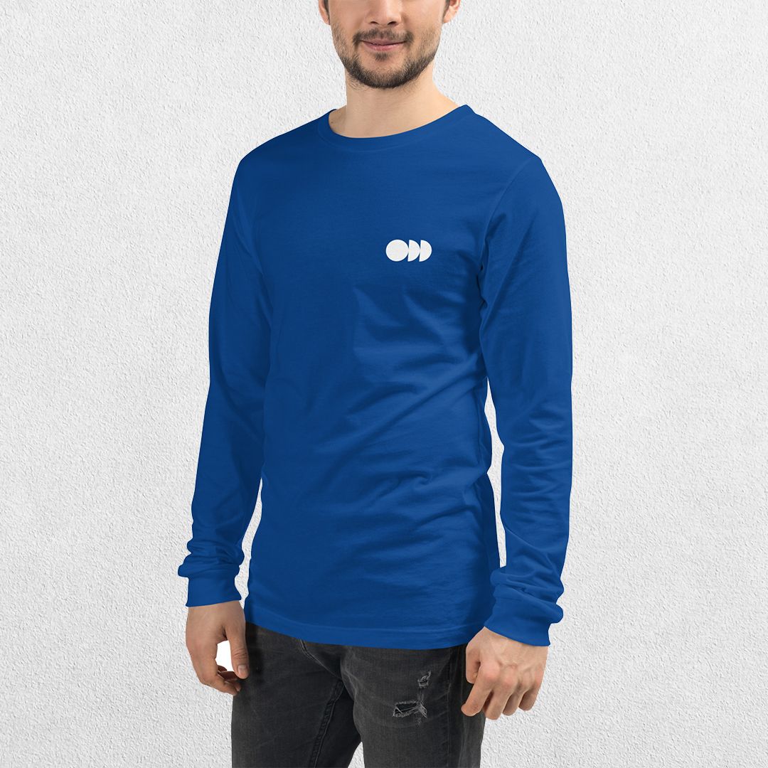 Model wearing the True ROyal GPW Long Sleeve Tee paired with jeans in a Studio Background.