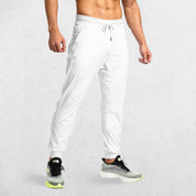 White GPW Men's Athletic Sweatpants featuring zipper pockets, athletic fit, and sleek design.