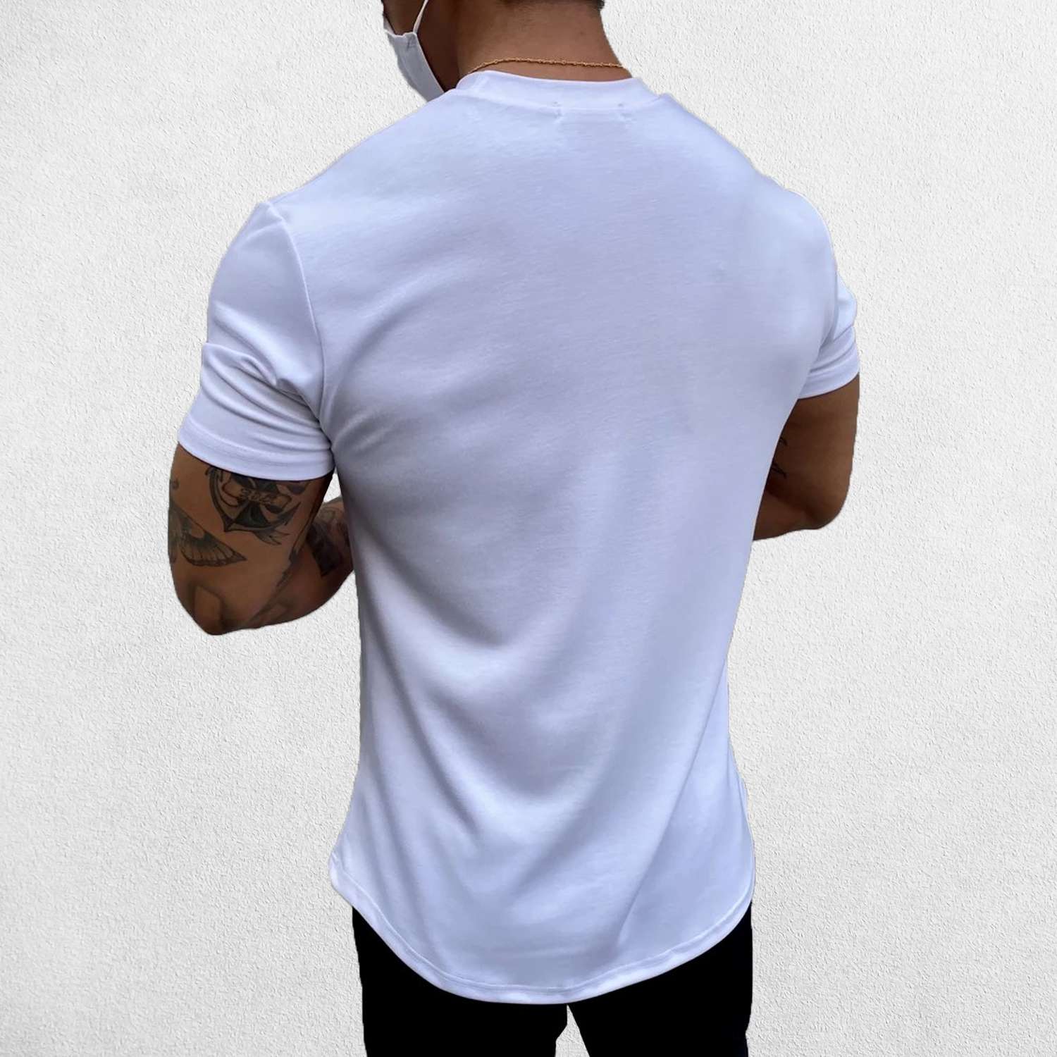 Close-up of White GPW Men's Fit Summer Gym T-Shirt - Bodybuilding Streetwear Tee in a studio background