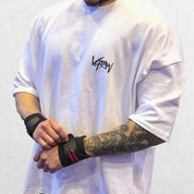Close-up of White GPW Men's Oversized T-Shirt - Casual Gym Bodybuilding Top