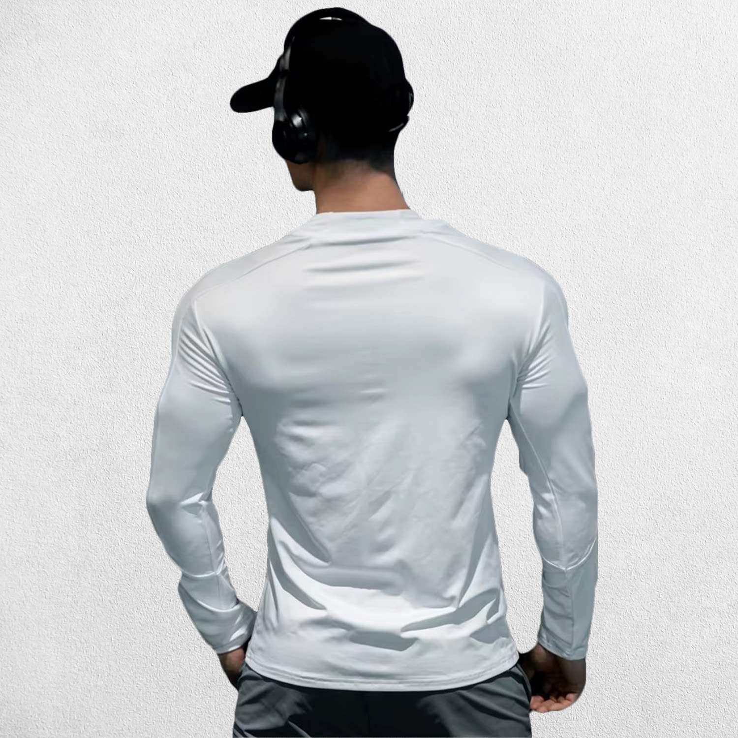 White Men’s slim-fit compression shirt with zipper and stretch fabric, back profile.