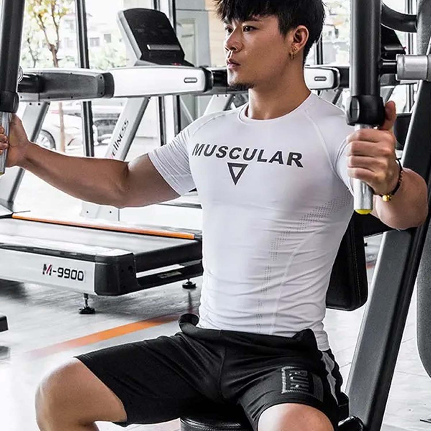 Model Having Workout wearing White Muscular Men’s Compression Sports T-Shirt – Quick-Dry, Slim-Fit Training & Fitness Tee for Gym, Running, and Workouts