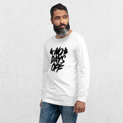 Model wearing the White No Days Off Unisex Long Sleeve Tee - Versatile Athletic and Casual Wear with jeans in studio background