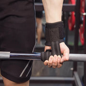 Black Adjustable Weight Lifting Wrist Straps providing heavy-duty support during a lift.