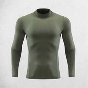 Front view of men’s long sleeve compression shirt in a studio background