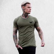 Front View of Model Wearing  Army Green Men’s V-Neck Slim Fit Gym T-Shirt – Breathable, Muscle-Enhancing Cotton Tee for Training & Casual Wear