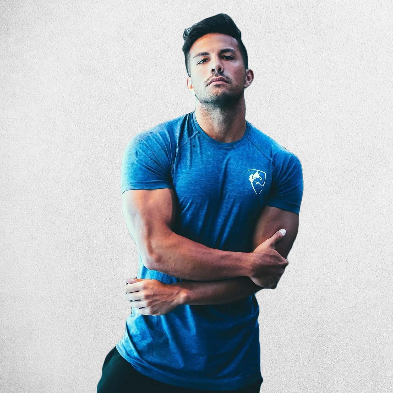ym Athlete wearing BLue Men’s Quick-Dry Bodybuilding Tight Muscle Shirt – Compression Fit for Fitness & Sports