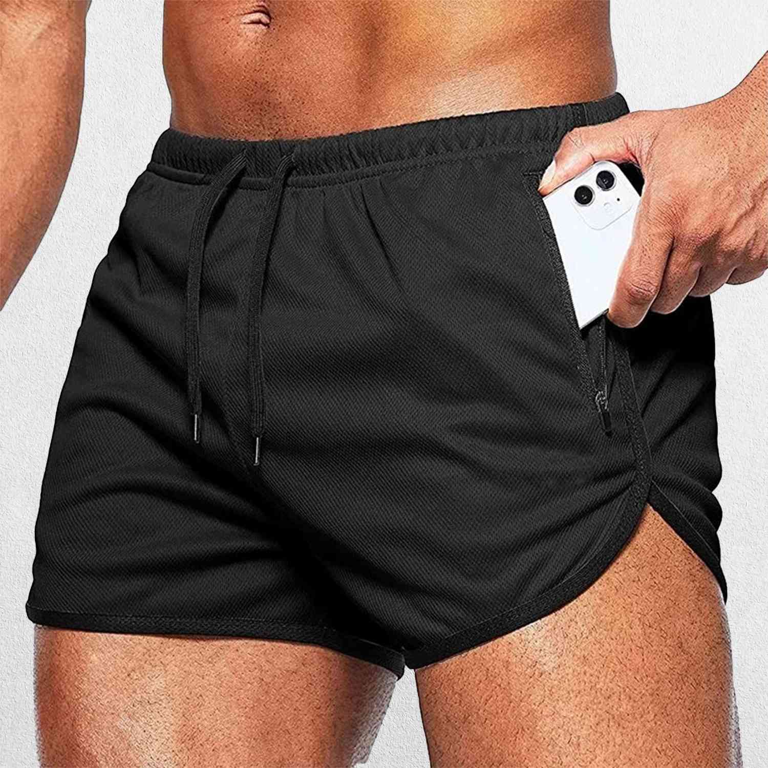 Close-up of Black GPW Men’s Running Shorts with Zipper pockets for Gym Fitness, Football & Beach Wear