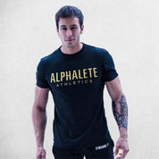 Model Wearing Black Gold Men’s Muscle Slim Fit Cotton Stretch T-Shirt for Gym, Workout & Casual Wear
