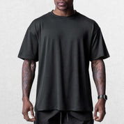 Close-up of Black Grey GPW Men's Summer Quick-Dry Gym Casual Tee in a studio background