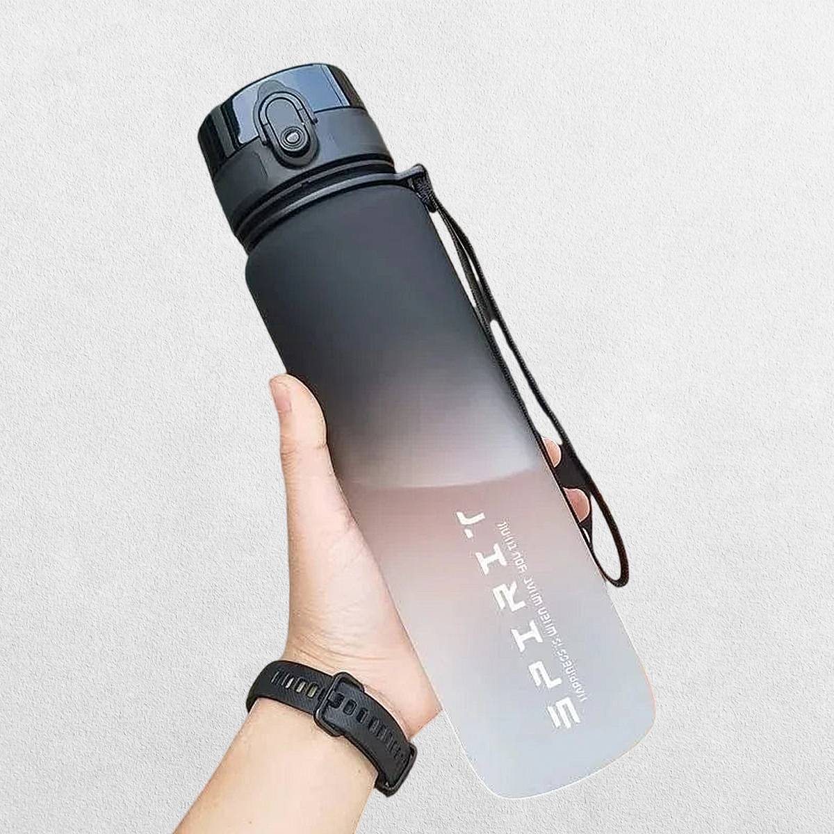 Person Holding BPA-free durable water bottle with stylish design.
