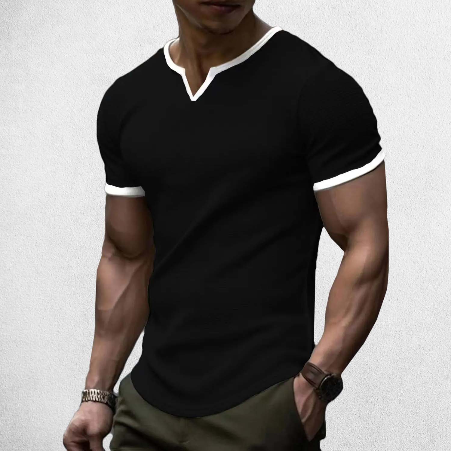 Model Wearing Black Men’s Casual Slim Fit V-Neck Waffle Solid Color Short Sleeve T-Shirt for Summer in a studio background