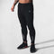 Front View of Model Wearing  Black Men’s gym joggers with breathable quick-dry fabric for fitness and running
