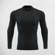 Front view of men’s long sleeve compression shirt in a Studio background
