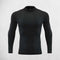 Front view of men’s long sleeve compression shirt in a Studio background
